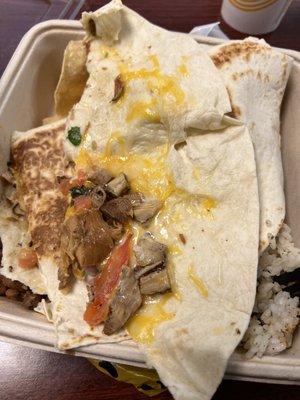 Vegetarian having meat put in their food. So frustrating... looking past that, why does 1/3 of the tortilla have nothing in it???