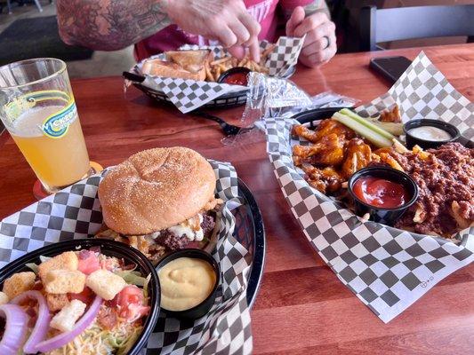 Omaha burger , wings, chili cheese fries , side salad