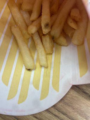 Little black hairs on my fries