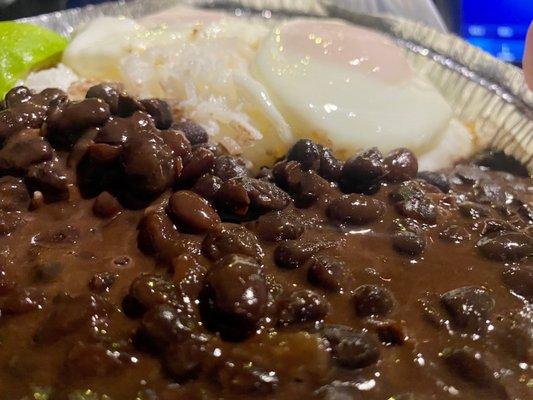 Frijoles negros(black beans) huevos(eggs)aguacate(avocado) Queso blanco Guatemala (soft white cheese) Crema(Guatemalan sour cream)