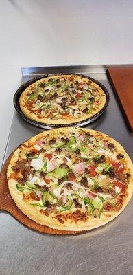 EHOP Special Pizza - pepperoni,  sausage,  hamburg, ham,  mushroom, onion, & peppers