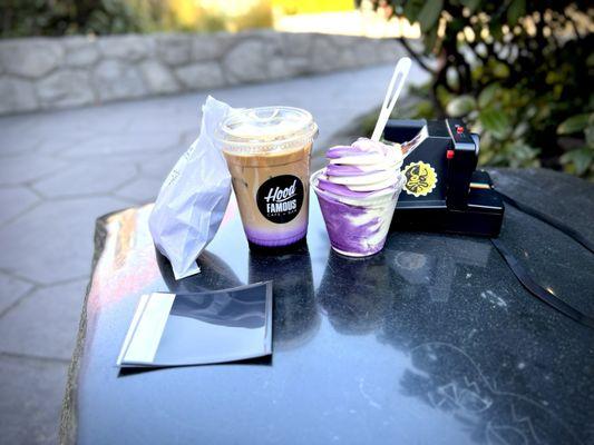 A hood famous iced ube latte and an ube/vanilla soft serve swirl in a cup.