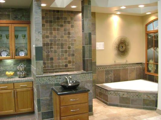 Corner jacuzzi style bath.