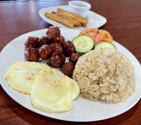 Garlic fried rice, eggs, and chorizo sausages (longanisa)!  Good food, friendly staff!