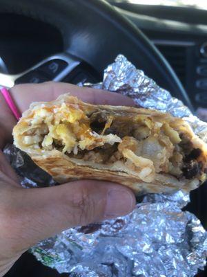 Yummy fully loaded sausage burrito