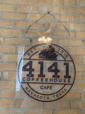 4141 Coffee House Sign inside dining area.