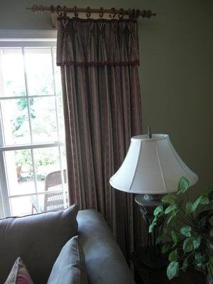 Pinch-pleated curtains with button-detailing