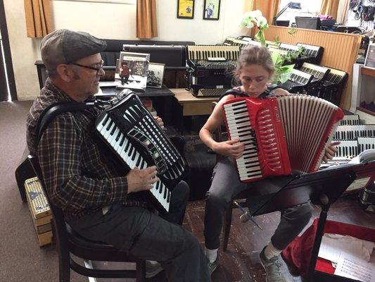 Jack and Dave playing during Jack's lesson at Dave's Accordion School