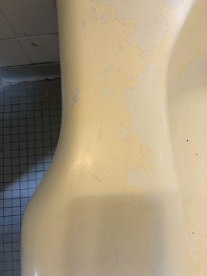 Before: Old paint on a bathtub