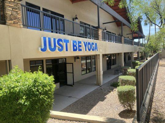 Just Be Yoga's sign/outside of our suite