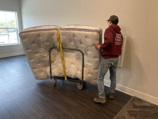 queen size mattress removal from an apartment with long-walk hall ways.