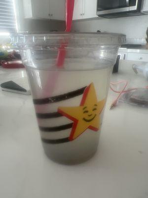 Mop water disguised as lemonade. What is the black sediment at the bottom of the cup? Beware this place.