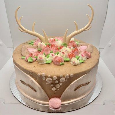 Sweet dear face cake with floral decor