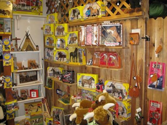 The cowboy room - western crafts, Breyer and Schleich and lots of plush horses too.