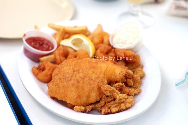 Fisherman's Platter ($22) - Fish, shrimp, clam strips and scallops. Served with hand cut fries, lemon, tartar sauce, cocktail sauce