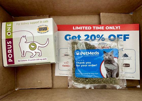 My package with a supplement, free catnip, and coupon