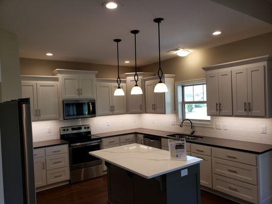 Kitchen island power and pendants are a must for most kitchen dwellers.