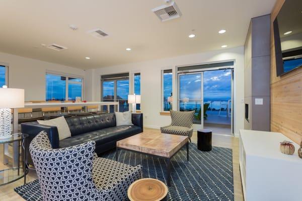 Relax with a beautiful view of the islands and mountain range in our resident lounge.