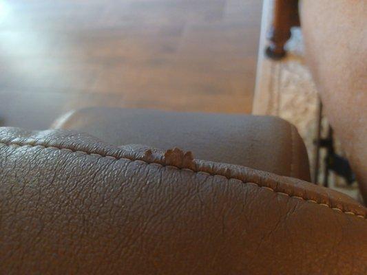 Sofa arm , fraying at the seam