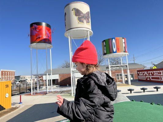 Cool water feature with local artists paintings