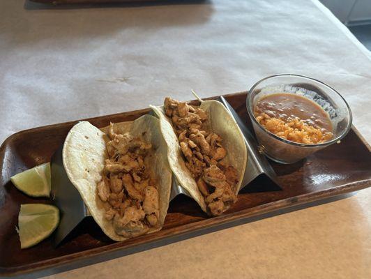 2 grilled chicken soft tacos w/ rice and beans.