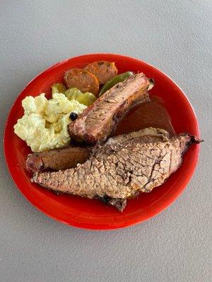 Beef brisket, pork rib, jalapeño cheese sausage, & potato salad