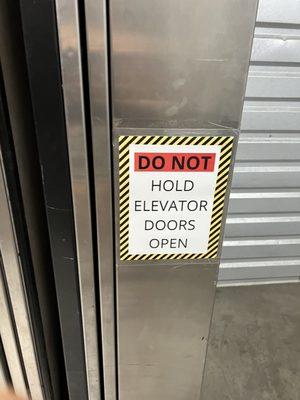 Sign on the elevator