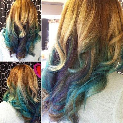 Amanda ~ Blonde Ombre with Balayaged Teal and Blue Peek-a-boos. Long layered textuized cut.
  www.zensalonatthelanding.com