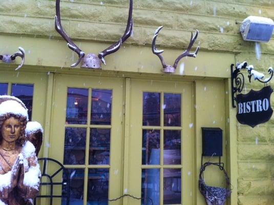 Storefront (with falling snow).