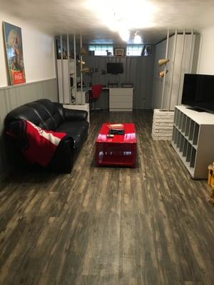 Concrete basement used for storage turned into living space with warmth and charm. Lyndhurst, OH