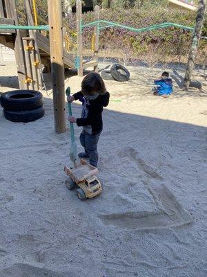 Playing outside in the sand