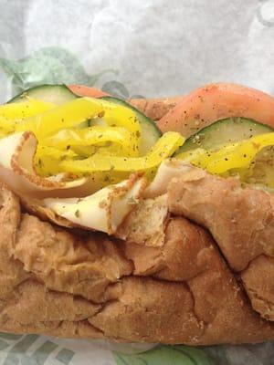 Turkey with cucumbers and banana peppers.