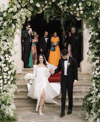 Our client Pierce on his wedding day w/ his beautiful bride wearing a custom Holland & Sherry mohair tuxedo