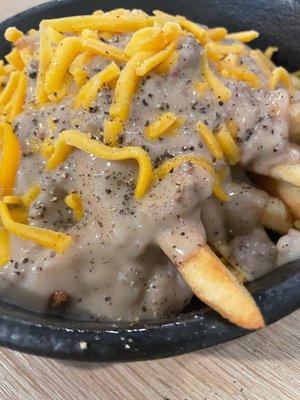 Bob evans - fries with sausage gravy on top and cheese ! Delicious