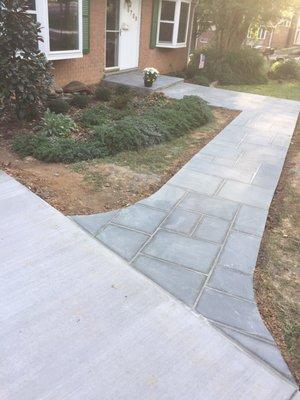 Blue pattern blue flag stone stoop and  sidewalk with concrete base