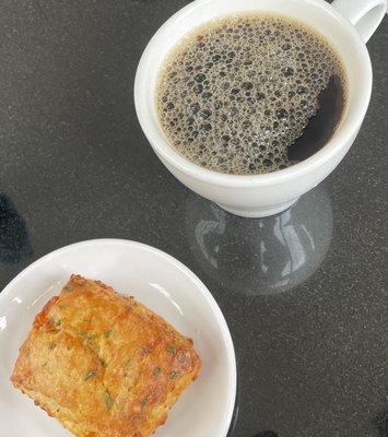 Great coffee and a tasty savory biscuit.