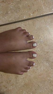 Pedicure with different colors.