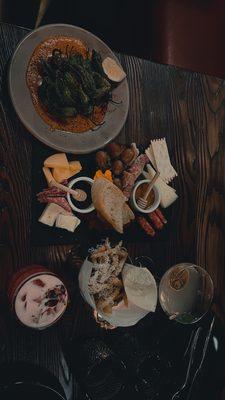 Shishito peppers, charcuterie board, truffle fries