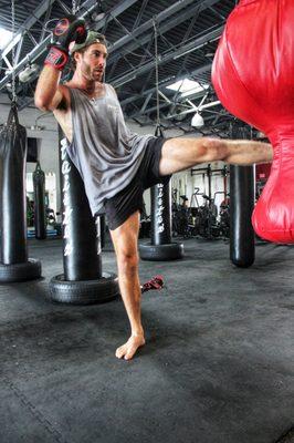 Kickboxing trainer Joe shows how to throw a powerful kick.