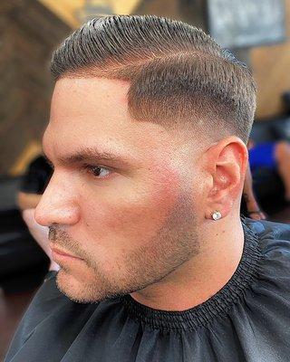 Cabs here, are you dapper ready? Low taper fade with trim & texture by Stuss the barber