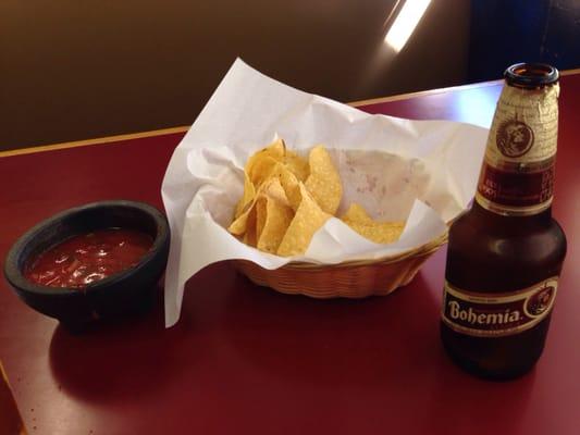 Complementary chips and salsa and a nice cold beer