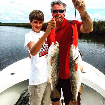 Father and son on reds