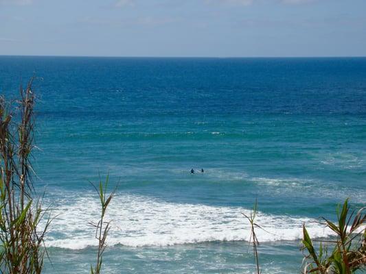 Elena with Uriah paddling out.