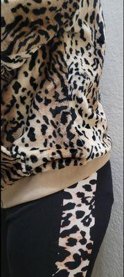 I purchased this velvety leopard sweater @ dd's and it matches my daughter's pants that I got from Temu.com months prior.