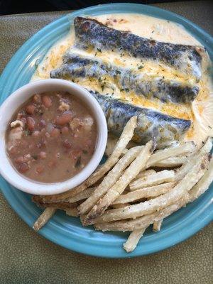 Blue Tortilla Beef Enchiladas covered in Queso, fries and boracho beans.