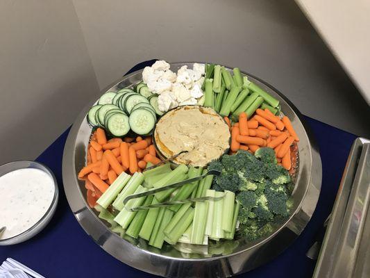 Fresh Veggie Tray with Hummus Dip as well as Ranch dip.