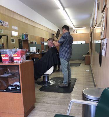 8/7/23 The barber doing his barber thing!