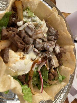 Steak taco salad was delicious. The meat was seasoned well and I enjoyed the shell.