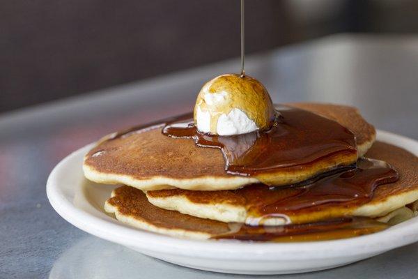 Buttermilk pancakes with real butter and homemade maple syrup!