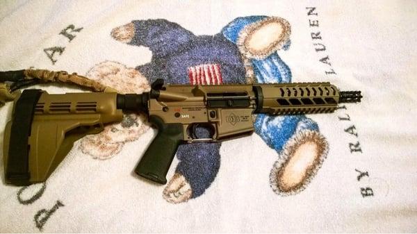 Another photograph of my Diamondback DB15 AR pistol in FDE with attached FDE sling and Sig Sauer SB15 pistol stabilizing brace.